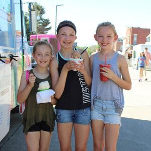 girls enjoying ice cream at junquefest