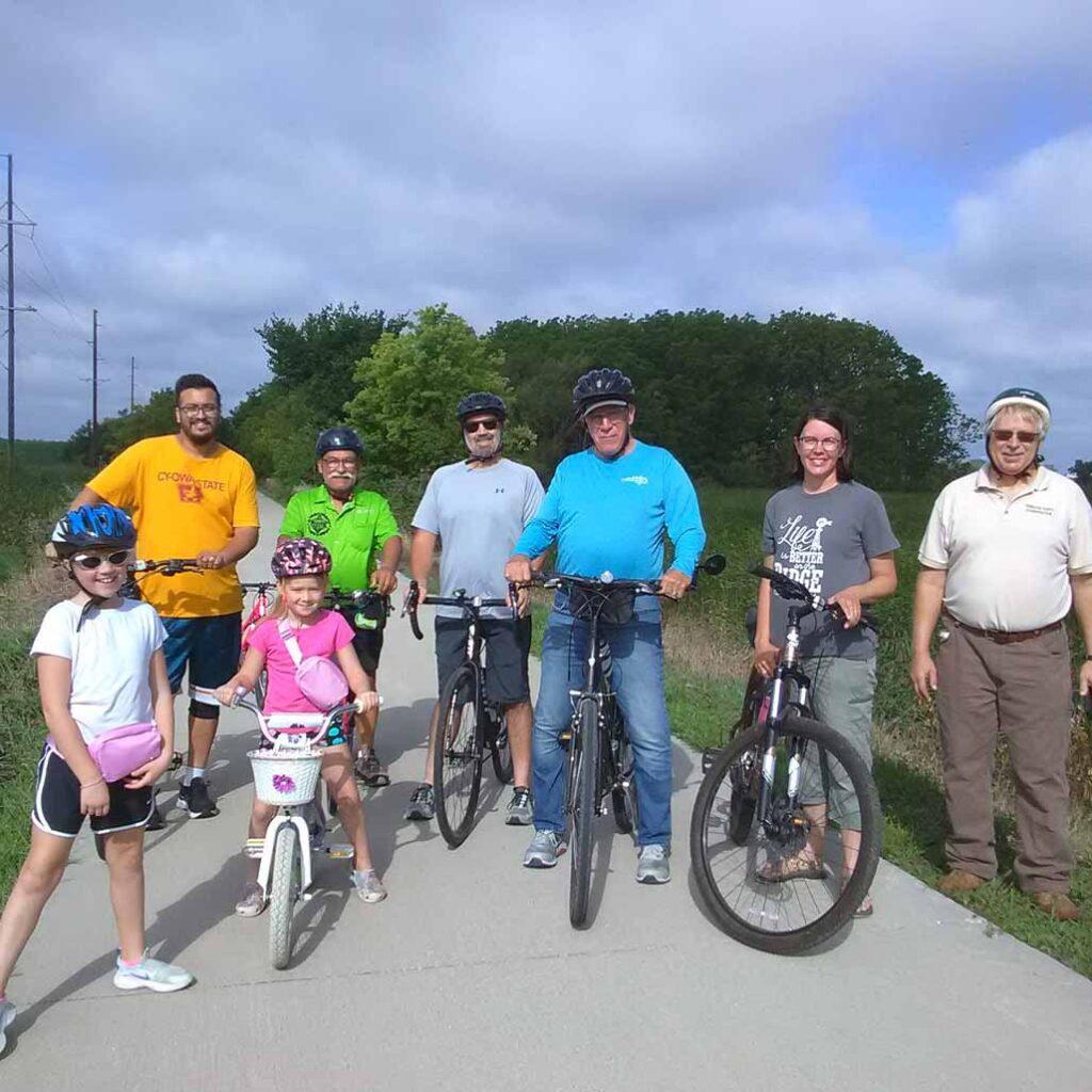 a group of people biking